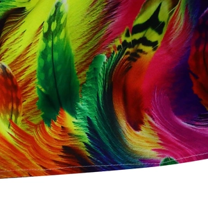 Detailed close-up of vibrant feather print fabric with high-quality hem stitching