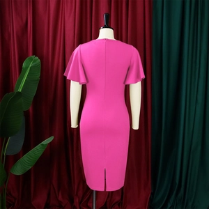 Close-up of elegant rose red fitted dress featuring ruffle sleeves and back slit detail