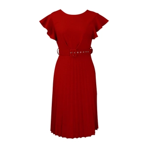 Detail of red pleated dress featuring layered ruffle sleeves and a matching belted waist