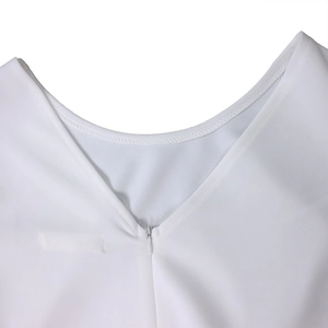 Close-up of white summer dress neckline with a hidden zipper and V-neck stitching detail