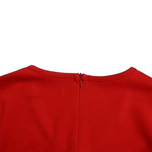 Close-up of a red pencil dress neckline featuring a matching invisible zipper and fine stitching