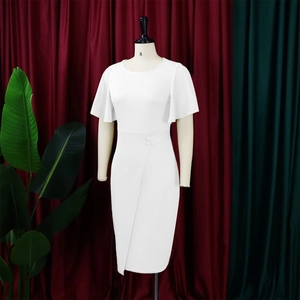 Detail of white pencil dress featuring bell sleeves and decorative waist buttons