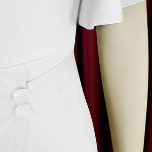 Detailed view of waist darts and matching buttons on this elegant white office dress