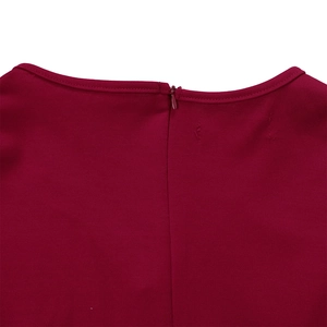 Close-up of the back neckline and hidden zipper of this burgundy puff sleeve dress