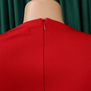 Close-up of the red dress back collar with a seamless invisible zipper and neat stitching