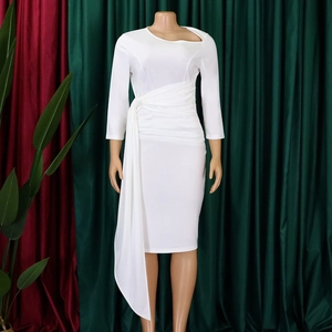 Detail of white long sleeve dress featuring waist pleats and side draped panel