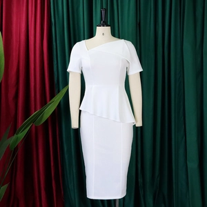 Detail of white midi dress with asymmetric neckline and elegant peplum waist structure