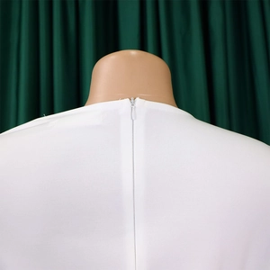 Detail of invisible back zipper and neckline on white elegant commuter dress