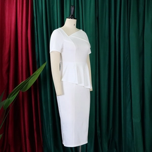 Side view of white peplum midi dress with asymmetrical neckline and bodycon pencil fit