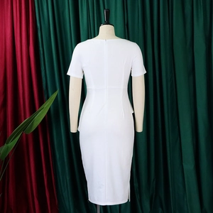 Rear view of white pencil dress showing the hidden zipper and elegant back slit detail