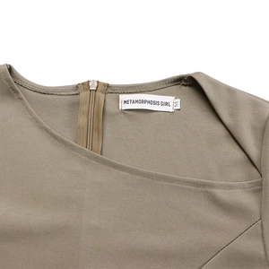 Detail view of khaki OL dress neckline with invisible back zipper and brand tag