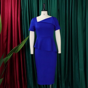 Detail of royal blue sheath dress with asymmetric neckline and side peplum waist
