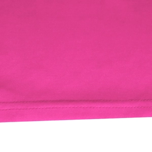 Detailed close-up of double-stitched hem on high-quality magenta pink knit dress fabric