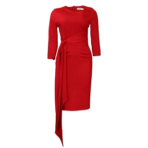Detail of red long sleeve dress featuring ruched waist and asymmetric hanging sash