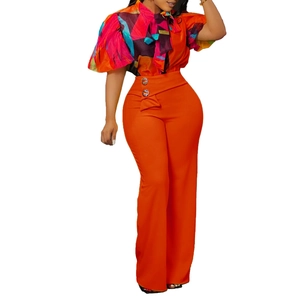 Damen-Zweiteiler mit geometrischem Print-Oberteil und oranger Weitbeinhose Mode-Set