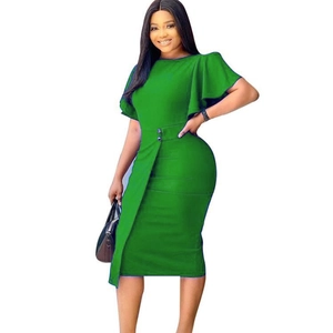 Detail of green professional dress featuring ruffle sleeves and waist button accents