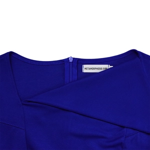 Detail of royal blue dress featuring a concealed back zipper and neck brand label