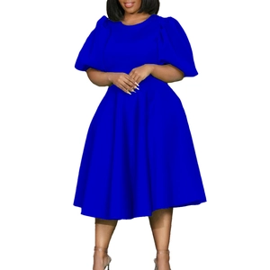Detail view of royal blue puff sleeves and waist design on the A-line dress