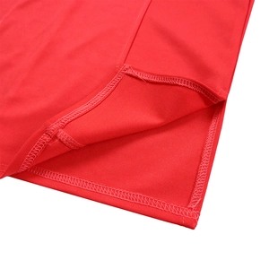 Detailed close-up of fine double-needle stitching on red glossy satin dress fabric