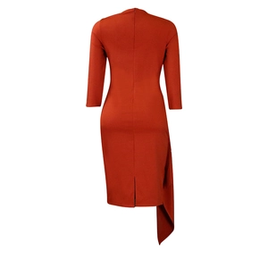 Back view of rust red bodycon dress with asymmetric hem and hidden rear zipper