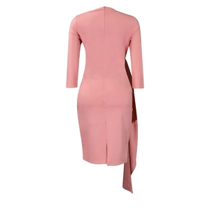 Detail view of pink bodycon dress featuring back invisible zipper and asymmetric ruffle
