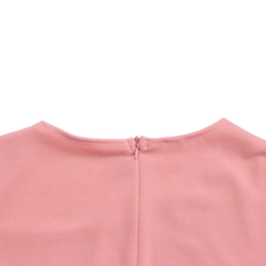 Close-up of pink professional dress featuring an invisible back zipper and fine stitching