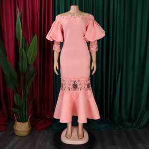 Detail of pink off-shoulder mermaid dress with lace splicing and elegant lantern sleeves