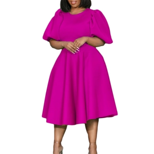 Detail view of fuchsia midi dress featuring voluminous puff sleeves and elegant crew neck