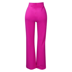 Detail of fuchsia high-waisted wide-leg trousers with back zipper and smooth texture