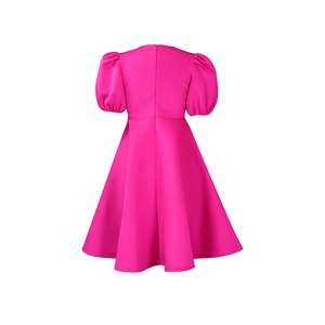 Detail of elegant rose red dress showing puffy sleeves and concealed back zipper closure