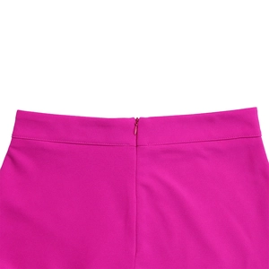 Close-up of the high waist invisible zipper on fuchsia stretch wide leg trousers
