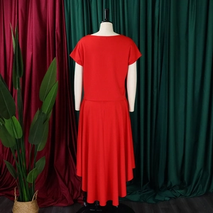 Rear view of red plus size two-piece set with loose top and high-low fishtail skirt