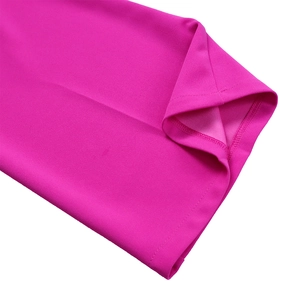 Detailed close-up of precise coverstitch sewing on magenta wide-leg trousers hem
