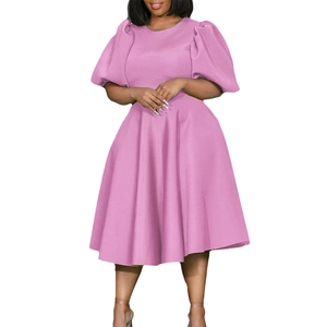Detailed view of puff sleeves and waist design on an elegant mauve pink A-line dress