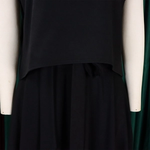 Detail of black two-piece set featuring a layered waist design and matching tie-up belt