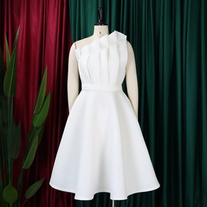 Detail of white one-shoulder evening gown with pleated bodice and A-line silhouette