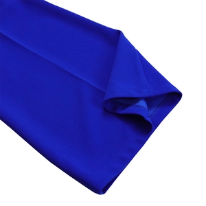 Macro shot of royal blue wide-leg trousers showing precise hem stitching and fabric texture