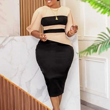 Close-up of puff sleeves and striped bodice on this slim fit pencil dress