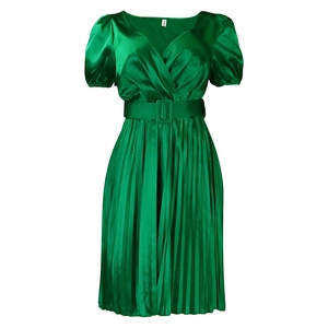Detail of emerald green satin dress with V-neck, puff sleeves and pleated skirt texture