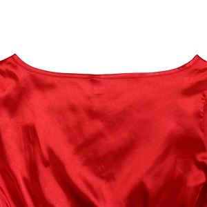 Detail of red V-neck satin dress with premium stitching and glossy fabric texture