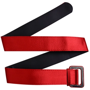 Detailed view of red satin wide waist belt with a sleek rectangular silver metal buckle