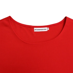 Close-up of neckline with brand label on red plus-size round neck two-piece set
