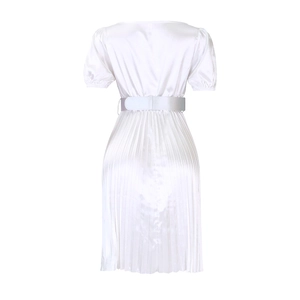 Detailed view of white pleated satin dress with puff sleeves and matching wide waist belt