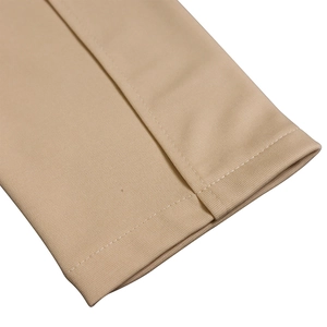 Macro shot of sleeve cuffs showing neat single-needle stitching and twill fabric texture