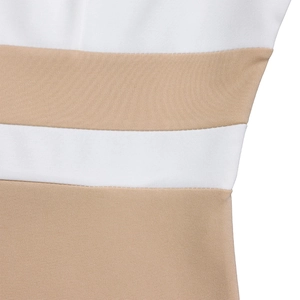 Detail of color-block dress showing white and tan knitted fabric with flat seam stitching