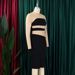 Dettaglio del moderno patchwork geometrico bicolore sul lato di un vestito aderente