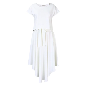 Close-up of white two-piece set with irregular hem skirt and waist tie detail