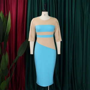 Detail of color-block plus size dress with blue and khaki geometric patchwork