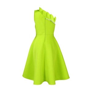 Detail of layered organza ruffles on the shoulder of a neon green evening gown