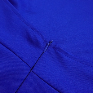 Detail of invisible zipper and fine stitching on the navy blue backless outfit set